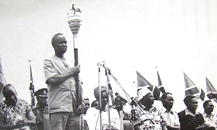 Julius Nyerere, Africa's elder statesman. Behind Nyerere are Kaunda, Machael, Obote
